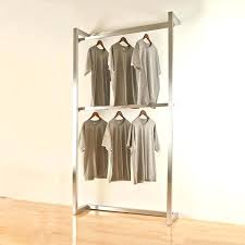 What types of retail clothing racks are available? Commercial Retail Portable Wall Mounted Metal Clothes Rack Boutique Store Fixtures Manufacuring Retail Shop Fitting Display Furniture Supply