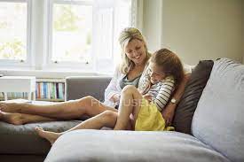 Shop wayfair for a zillion things home across all styles and budgets. Woman And A Child On Sofa Sharing Family Stock Photo 134276304