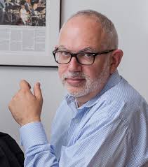 AEA Consulting — About — Adrian Ellis