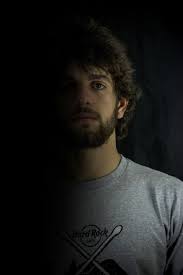He was the son of a r Michele Di Rienzo