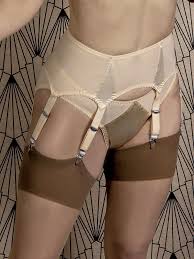 If you're new to wearing stockings or have tried them before and find that they slip then the answer is an amazing suspender belt (garter belt). Suspender Belt Elegant Satin 6 Strap Suspender Belt What Katie Did Ltd