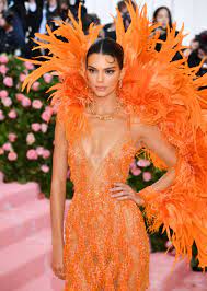 Jenner and styles, for what it's worth, have both moved on. Kendall Jenner Wears Orange Feathered Dress To Met Gala 2019