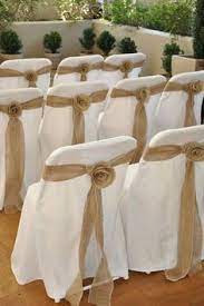 Chair covers instantly transformed the room to a chic and modern look! Wedding Chair Decorations Wedding Chairs Wedding Table Decorations Vintage