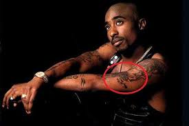 Tattoofilter is a tattoo community, tattoo gallery and international tattoo artist, studio and event directory. Tupac Shakur S 21 Tattoos Their Meanings Body Art Guru