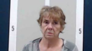 Nipped in the bud: Graveside granny charged with frequent floral felonies  in Alabama