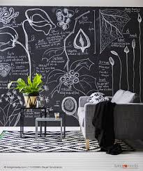 Sofa And Nest Of Side Table Against Blackboard Wall Covered In Labelled Drawings C Living4media Bauer Syndicati Blackboard Wall Chalkboard Art Wall Writing
