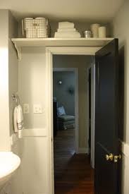 To Maximize Space In The Bathroom Add A Shelf Over The Door To Store Extras Like Toilet Paper And Extr Clever Bathroom Storage Bathrooms Remodel Small Bathroom