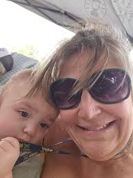 Boys bear pen, she is wearing goggles and an inner tube brand new