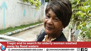 The search for an elderly woman washed away in the Sandy Gully