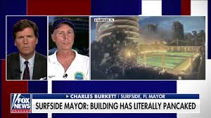 Miami rescue workers pick through rubble for survivors. Egkk00dbvwnn4m