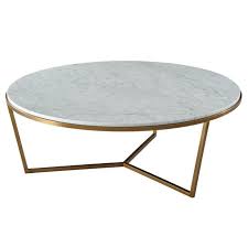 Adding wheels is a good idea because this wooden table design will be hard to move without them. Ta Studio Round Coffee Table Fisher In Marble Theodore Alexander