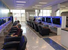 Book now as spots are filling up fast! Dfw Airport Added A Gaming Lounge So You Can Game While You Wait For Your Plane Gaming Lounge Video Game Room Design Video Game Rooms