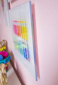 It's a great starting point for craft storage too—like with these paints, scissors, and spools. Diy Craft Room Wall Art Idea Design Improvised