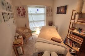 Holistic Massage Hot Stones And Hot Tub Massage Room Decor Massage Room Massage Therapy Rooms