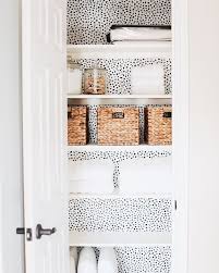 Black And White Polka Dot Wallpaper In Hall Closet So Cute Linen Closet Makeover Home Decor Inspiration Home