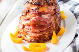 How long to bake a spiral ham. Peach Glazed Spiral Ham Recipe Frugal Mom Eh