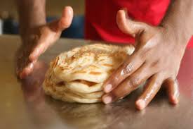 If you've watched with amazement how pizza bakers toss the dough into the air, spin it and repeat the process until the dough has doubled or even tripled in diameter, wait until you see what is done to roti canai dough. Malaysian Roti Canai Recipe
