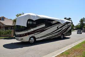 Also, roofs have caulking that seals all holes caused by the installation of rv roof vents, skylights the warranty only covers one replacement rv cover. Adco Rv Roof Top Covers Carcoverusa