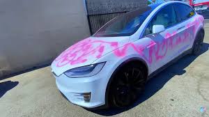 Then this certainly make them happy. Tesla Owner Graffitis Own Car For Bizarre Unicorn Wrap