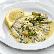 The sardines, abundant in the bay, are fresh fished, and seasoned with sweet and sour ingredients typical into the arab and italian cuisines, like saffron, pasta. Ricetta Sarde Marinate