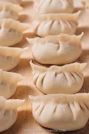 Dumpling is a broad class of dishes that consist of pieces of dough (made from a variety of starch sources) wrapped around a filling, or of dough with no filling. How To Make Chinese Dumplings Omnivore S Cookbook