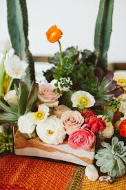 White floral centerpieces for a wedding add finesse and sophistication to a table. Cacti Love You Wedding Inspiration
