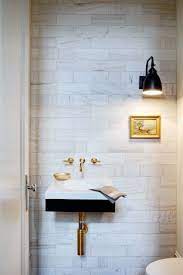 Look We Love Gold Fixtures In The Bathroom Tiny Powder Rooms Bathroom Inspiration Powder Room Small