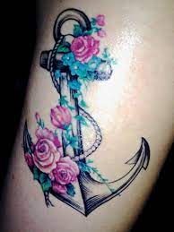 The crosswithin the anchor represents the unity of spirit and matter, and masculinity. Anchor With Flowers Tattoo Design