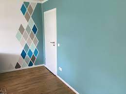 Feb 26, 2020 · interior designer heidi cailler gave this media room the black box theater effect without totally overwhelming the space by designating the deep marine paint the tv wall. Karomuster Im Wohnzimmer Mit Schoner Wohnen Farbe Bedroom Wall Paint Bedroom Wall Designs Geometric Decor