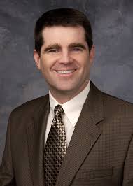 John McCool, Senior Vice President and General Manager, Data Center,  Switching and Services Group, Cisco