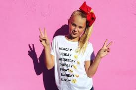 The 9 Things You Didn T Know About Jojo Siwa Tigerbeat Kid in a candy store . the 9 things you didn t know about jojo