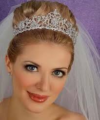 Image result for wedding tiaras with veils