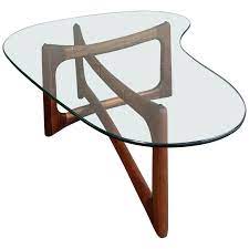 They are mid century masterpieces in their simplicity of design and clean, organic forms. Adrian Pearsall Sculptural Walnut And Glass Coffee Table At 1stdibs
