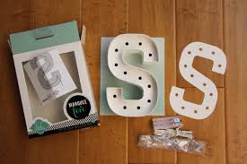 Do too much and the hot glue will dry before you get there. Diy Marquee Letter Lights Since Wen
