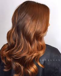 The big curls at the ends of the hair are beautifully reminiscent of the ocean. Wavy Copper Brown Hair Hair Color Balayage Red Balayage Hair Copper Hair Color