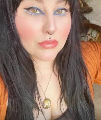 Are others experiencing eye color changes to green and seeing green energy?