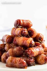 Oh my, you have got to try this bacon wrapped little smokies recipe. Bacon Wrapped Smokies Real Housemoms
