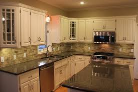 ← black slate subway backsplash tile white cabinet brown glass travertine backsplash granite countertop →. Black Kitchen Granite Countertops With Tile Backsplash And White Cabinets Granite Countertops Kitchen Black Granite Countertops Dark Granite Countertops