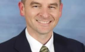 Derby residents pack school board meeting to support principal's lesson