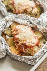 They are just so darn simple to put together with practically no clean up. These Chicken Parmesan Foil Packets Are Loaded With Veggies For A Full Meal Deal The Ultimate Comfort Food Foil Packet Meals Full Meal Recipes Foil Pack Meals