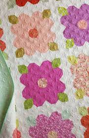 This quilt is as easy as it gets. Woodberry Way Summer Blossoms A New Flower Quilt Pattern Flower Quilt Patterns Floral Quilt Patterns Girl Quilts Patterns