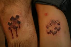 Autism puzzle piece tattoo on arm. 12 Amazing 3d Puzzle Tattoos Ever