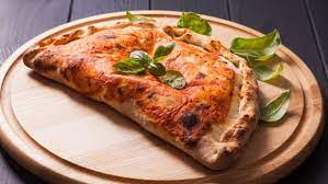 The Biggest Differences Between A Calzone And Stromboli