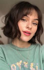 The side swept loose waves are sultry and seductive if you want a look that's both youthful and chic. Bob Haircut With Fringe Cute Bob Fab Wedding Dress Nail Art Designs Hair Colors Cakes