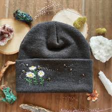 We are a popular organization engaged in trading a versatile range of cap embroidery machine. Sweet Buzzy Bees On A Fuzzy Beanie Nfs Embroideryinstaguild Embroidelici Sewing Embroidery Designs Hand Embroidery Designs Diy Embroidery