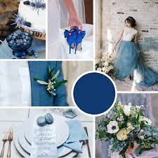 This royal blue and white wedding dress is lined with silver and gray, picking up the light as it moves. Classic Blue Wedding Moodboard Classic Blue Wedding Pantone Wedding Popular Wedding Colors