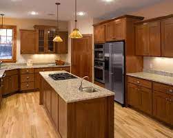This light floor balances the use of darker cabinetry and add a focal point to the open floor plan. See More Ideas About Alluring Oak Kitchen Cabinets Best Oak Kitchen Cabinets Design Ideas Remodel Pictures Kitchen Cabinet Layout Tuscan Kitchen Kitchen Design