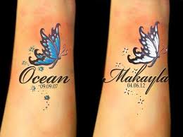 Butterfly Wrist Tattoos With Names Butterfly Tattoo Designs Butterfly Name Tattoo Butterfly Wrist Tattoo