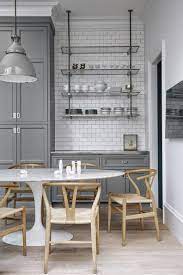 Nannette brown added american olean tiles to the ceiling, stove's backsplash, and a. 20 Gorgeous Gray And White Kitchens Maison De Pax