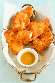 Place the finished chicken pieces onto the tray about 1 inch apart. Crispy Parmesan Panko Chicken Tenders Valerie S Keepers Recipe Panko Chicken Tenders Panko Chicken Chicken Recipes